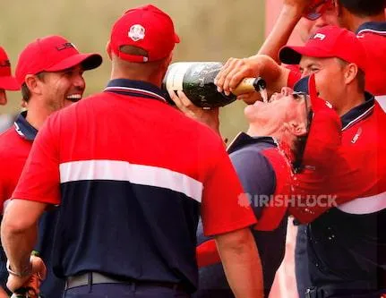 Golf - The 2020 Ryder Cup - Whistling Straits, Sheboygan, Wisconsin, U.S. - September 26, 2021 Team USA vice captain Phil Mickelson, Team USA's Jordan Spieth and Team USA's Brooks Koepka celebrate with champagne after winning The Ryder Cup, Source: REUTERS/Jonathan Ernst.