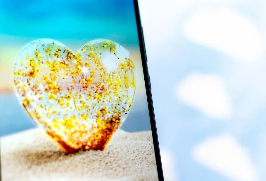 Love Island TV show - logo on the smartphone screen.