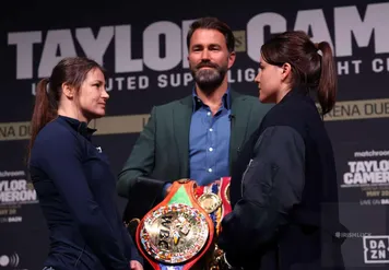 Katie Taylor (left) with Chantelle Cameron as Promoter, Eddie Hearn looks on during a press conference at The Mansion House, Dublin. Picture date: Monday March 20, 2023