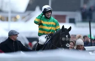 Jockey Jonjo O'Neill Jr. on Early Doors celebrates winning the Martin Pipe Conditional Jockeys' Handicap Hurdle during Gold Cup Day of the 2019 Cheltenham Festival at Cheltenham Racecourse.