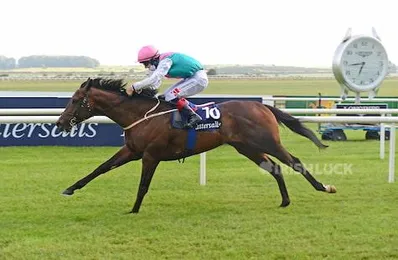 Hermosa and Ryan Moore win the Group 1 Tattersalls Irish 1,000 Guineas during day two of the Curragh Spring Festival at Curragh Racecourse, County Kildare