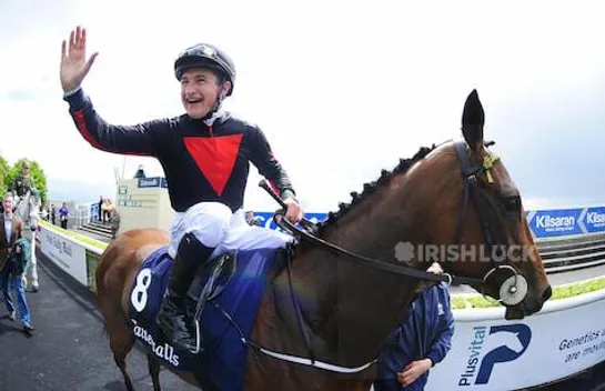 Jockey Shane Foley celebrates after winning the Tattersalls Irish 1,000 Guineas on Jet Setting during day two of the Tattersalls Irish Guineas Festival at Curragh Racecourse
