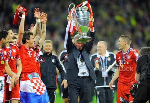Champions League Cup Final, Borussia Dortmund vs. FC Bayern Munich in Wembley Stadium, London, UK on 25.05.2013 --- Trainer Jupp Heynckes (Bayern MŸnchen) lifts the trophy